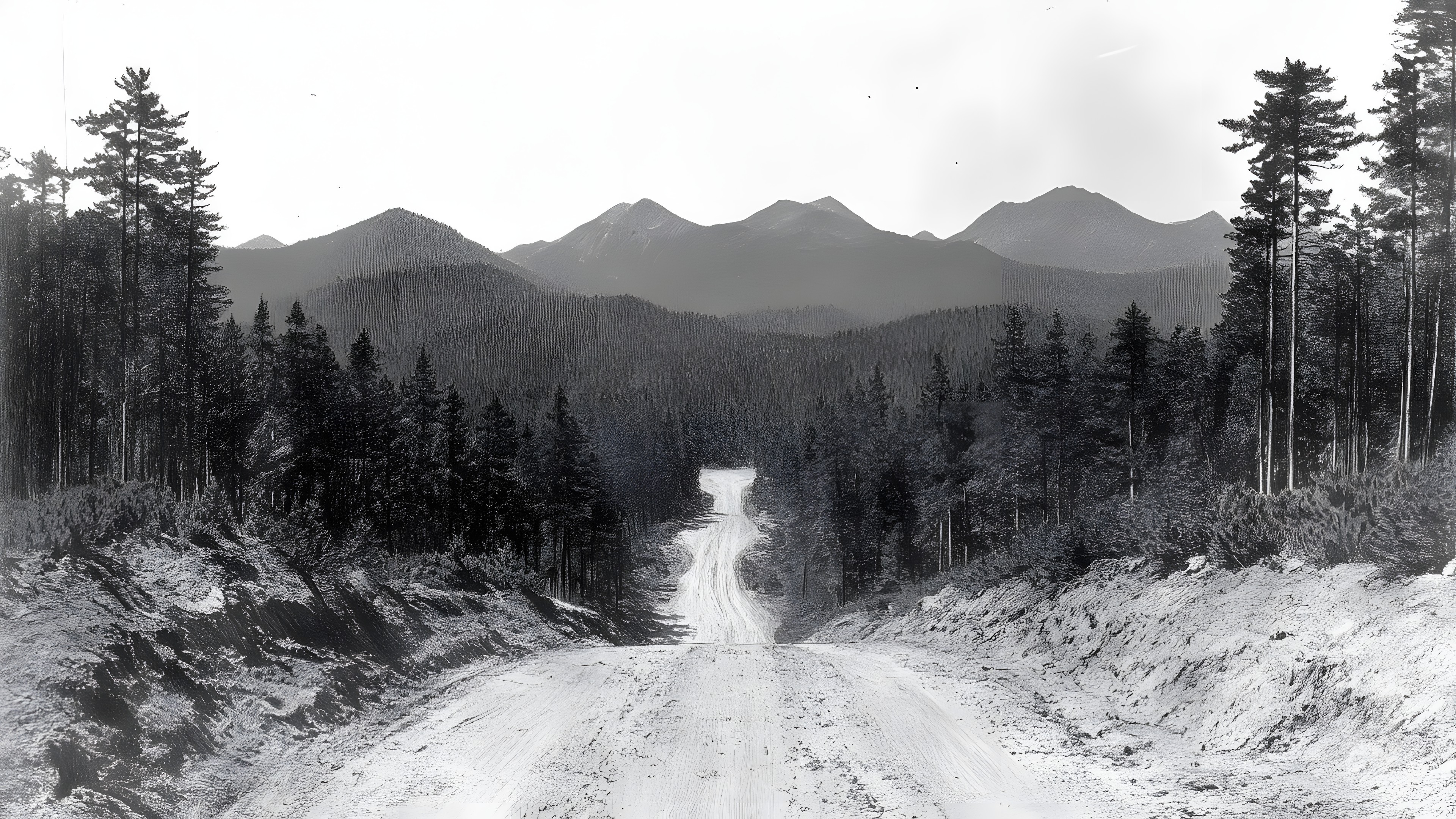 Mountainous landforms, Mountain, Snow, Winter, Hill, Monochrome photography, Road, Wilderness, Highland, Mountain range, Spruce-fir forests, Forest, Hill station, Valley, Freezing, Larch, Trail, Dirt road, Mountain pass, Ridge