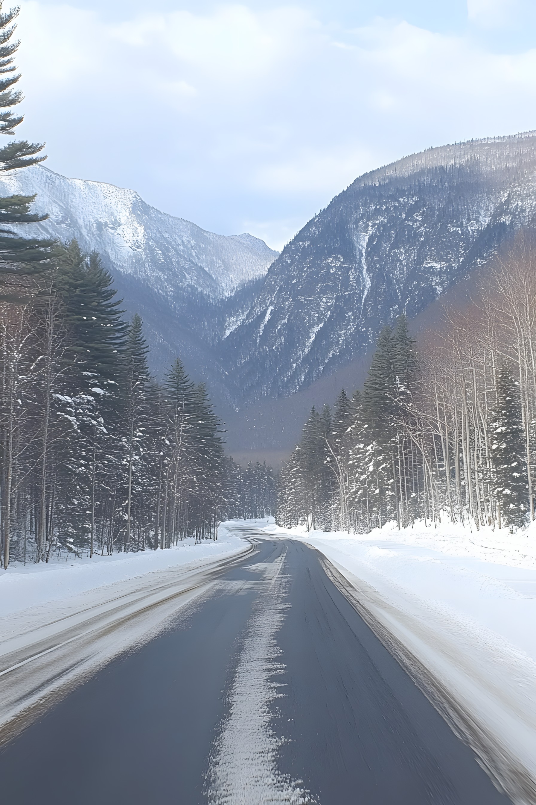 Mountainous landforms, Mountain, Snow, Winter, Road surface, Road, Natural landscape, Highland, Hill, Mountain range, Wilderness, Landscape, Thoroughfare, Terrain, Hill station, Slope, Freezing, Spruce-fir forests, Highway, geological phenomenon