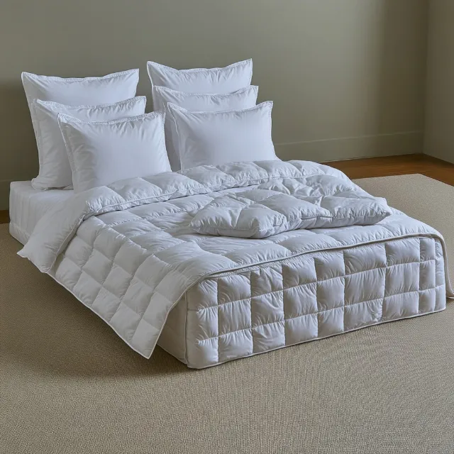 Linens, White, Bedroom, Textile, Furniture, Bed, Bed sheet, Bedding, Duvet, Blanket, Grey, Pillow, Silver, Throw pillow, Bed frame, Mattress, Bed skirt, Cushion, Lamp, Quilt