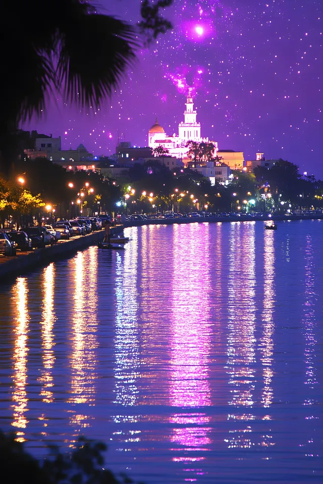 Water, Body of water, Water resources, Night, City, Waterway, Lighting, Reflection, Midnight, Lake, Tourist attraction, Tower, Electricity, Darkness, River, Evening, Skyline, Resort town, Dusk, Beach