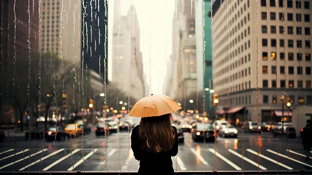 Building, Daytime, Skyscraper, Umbrella, Car, Light, Vehicle, Human, Infrastructure, Fashion, Automotive lighting, Standing, Architecture, Mode of transport, Road surface, Thoroughfare, Tower block, Line, Cityscape, Tower