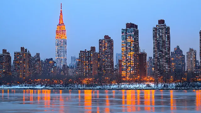 Water, Skyscraper, Building, Sky, Daytime, Tower block, Tower, Cityscape, Dusk, Condominium, City, Horizon, Metropolitan area, Metropolis, Commercial building, Mixed-use, Liquid, Downtown, Reflection, Art