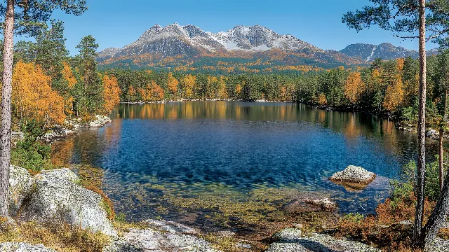 Water, Sky, Plant, Mountain, Natural landscape, Natural environment, Larch, Lake, Tree, Highland, Lacustrine plain, Watercourse, Bank, Landscape, Mountain range, Mountainous landforms, Forest, Tarn, Fluvial landforms of streams, Mountain river