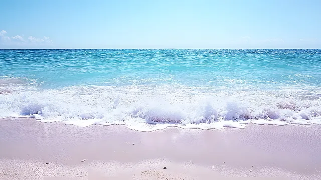 Blue, Daytime, Water, Body of water, Fluid, Wave, Beach, Sea, Liquid, Wind wave, Coastal and oceanic landforms, Ocean, Shore, Coast, Foam, Sand, Tropics, Wind, Shoal, Caribbean