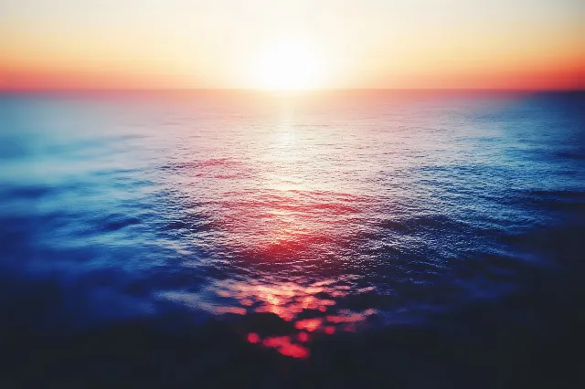 Blue, Red, Horizon, Fluid, Afterglow, Sun, Sunset, Sunrise, Orange, Sea, Liquid, Dusk, Red sky at morning, Ocean, Sunlight, Astronomical object, Evening, Heat, Reflection, Dawn