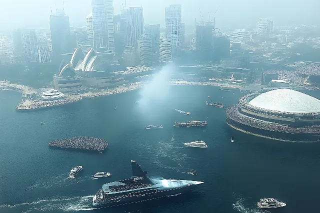 Water, Boat, Watercraft, Waterway, Skyscraper, atmospheric phenomenon, Naval architecture, High-rise building, Tower, Sea, Metropolis, Cityscape, Ship, Passenger ship, Aerial photography, Water transportation, Cruise ship, Skyline, Haze, Ocean liner