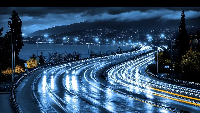 Cloud, Sky, Automotive lighting, Plant, Light, Black, Lighting, Road surface, Tree, Asphalt, Electricity, Vehicle, Mode of transport, Natural landscape, Line, Thoroughfare, Landscape, Midnight, Road, Electric blue