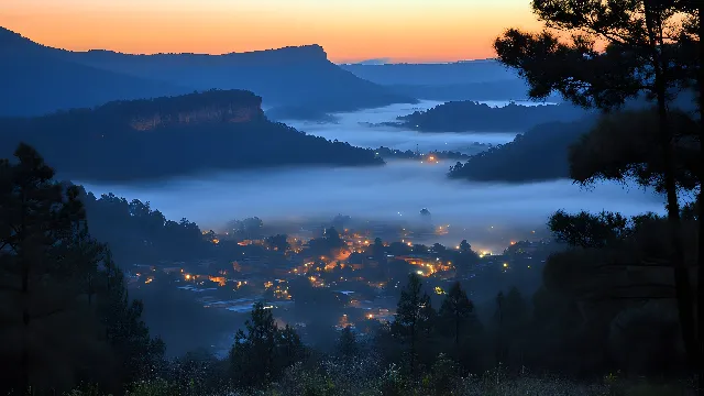 Mountainous landforms, Mountain, Hill, Natural landscape, Highland, atmospheric phenomenon, Sunrise, Dusk, Hill station, Mountain range, Valley, Evening, Forest, Morning, Sunset, Sunlight, Afterglow, Mist, Jungle, Ridge