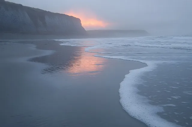 Water, Body of water, Horizon, Fluid, Sea, Coastal and oceanic landforms, Coast, Beach, Dusk, Liquid, Landscape, Ocean, Sunrise, Terrain, Shore, Evening, Headland, Geological formation, atmospheric phenomenon, Morning